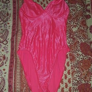 Hot pink 80s style swimsuit